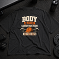 Body Under Construction Pump Cover funny oversized gym shirt with barbell and hard hat design
